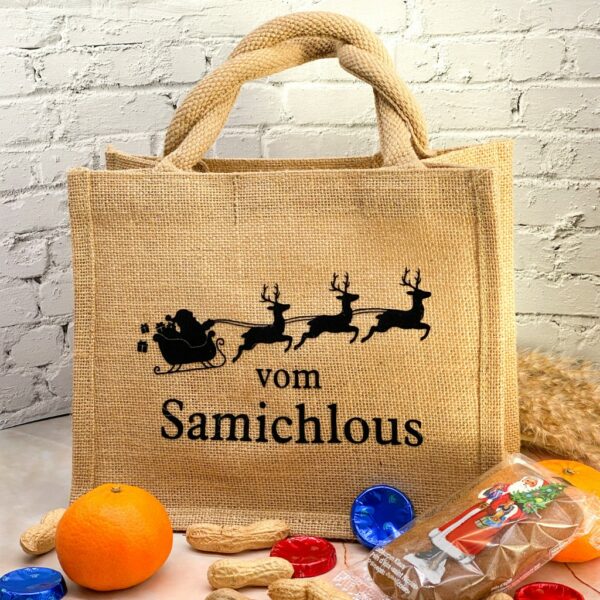 Jutetasche mit schwarzem Aufdruck "vom Samichlous" sowie einem Nikolausschlitten