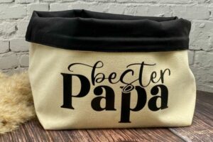 Baumwollkörbchen beige mit schwarzem umschlagbaren Futter und dem Spruch "bester Papa" in schwarz bedruckt